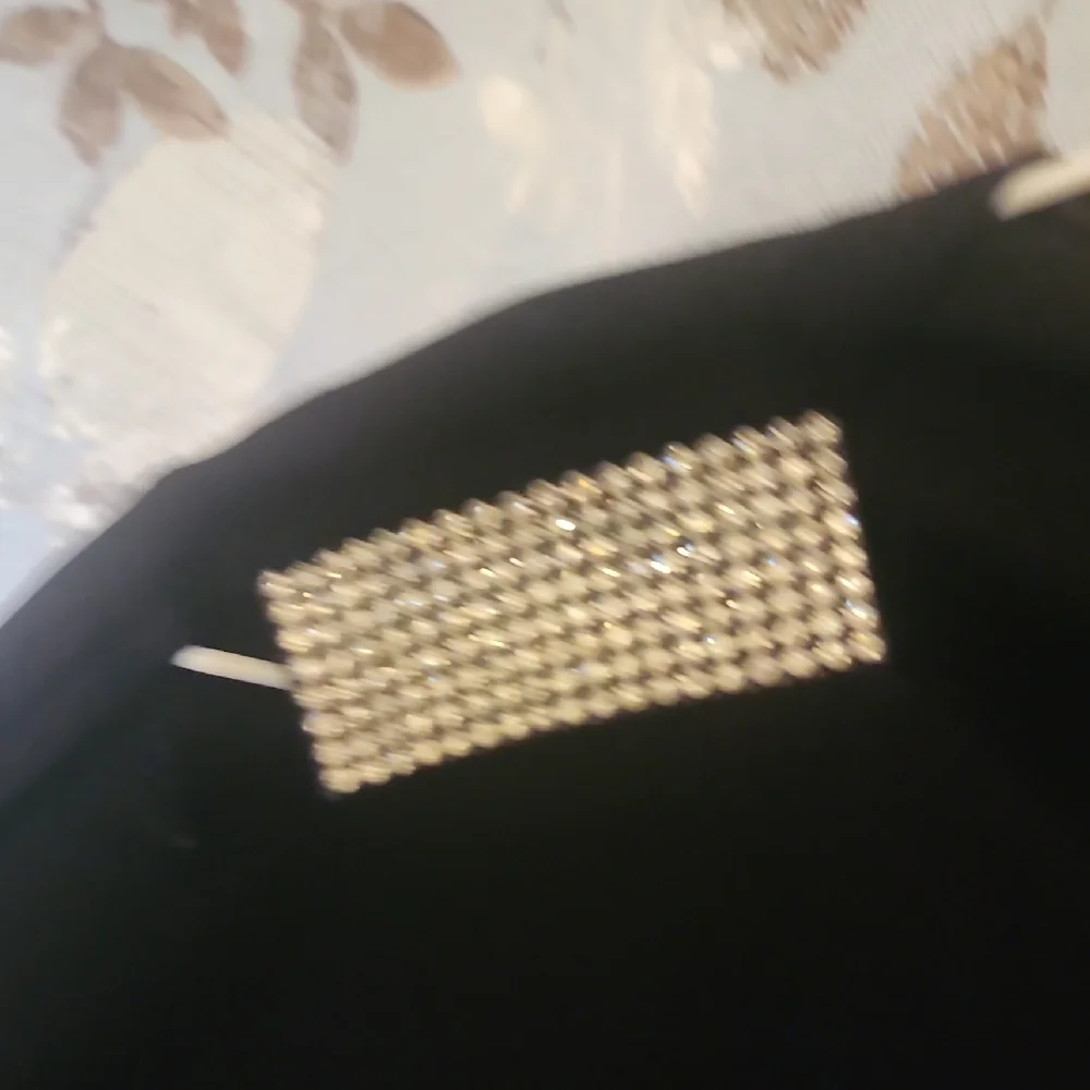 Chic Black Blouse with Embellished Shoulders - Picture 4 of 5